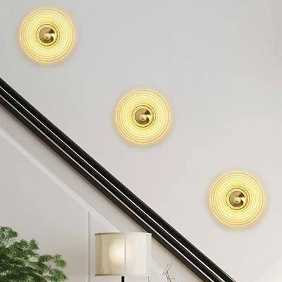 Kinkiety ozdobne do salonu, sypialni i jadalni – dekoracyjne oświetlenie ścienne