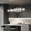 Lampa wyspowa Atomo - 7 źródeł światła - Szczotkowane złoto (QN-ATOMO-LP7-BG) - Quintiesse