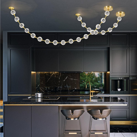 Efektowna lampa wisząca LED Marni długa - Naturalny mosiądz (QN-MARNI-16P-292-NBR) - Quintiesse